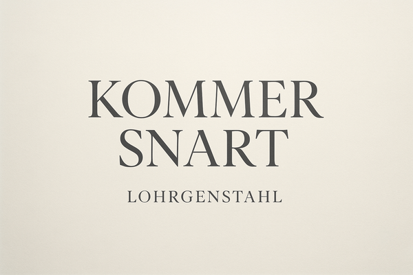 Genereta a "KOMMER SNART" with font italiana and then at the botom have a smaller size shwoing my website name LOHRGENSTAHL